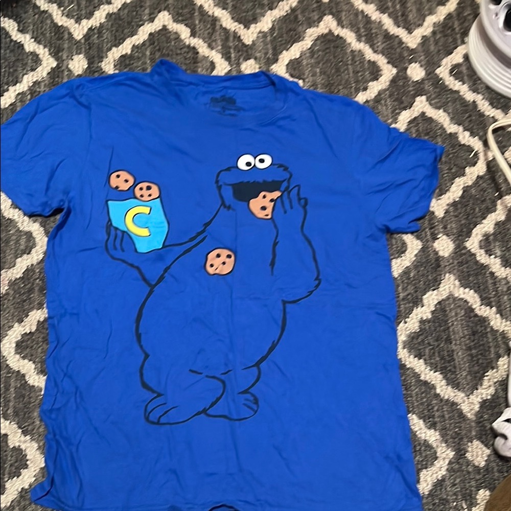 Blue tee with cookie monster logo